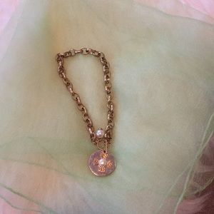 Silver, gold, and pearl necklace